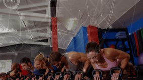 Six-person fitness group placing hands on kettlebells, initiating coordinated push-ups for strength. Strength, teamwork, training, fitness, gym, structure, unity - Powered by Shutterstock - Get 15% off with code: PIKWIZARD15