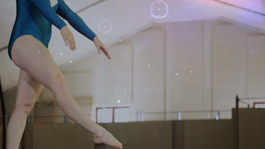 Gymnast stepping onto beam initiating split leap while overlay tracing path in gymnastics training. Athletic, performance, discipline, motion, choreography, elegance, strength