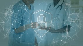 Nurse tapping tablet and physician holding device pulsing network and padlock securing patient data. Healthcare, collaboration, technology, cybersecurity, innovation, professionalism, digital - Powered by Shutterstock - Get 15% off with code: PIKWIZARD15