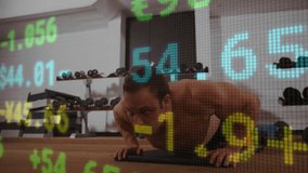 Man initiating push-up cycle in gym and generating financial data overlay for tracking volatility. Fitness, workout, strength, training, data visualization, financial chaos, determination - Powered by Shutterstock - Get 15% off with code: PIKWIZARD15