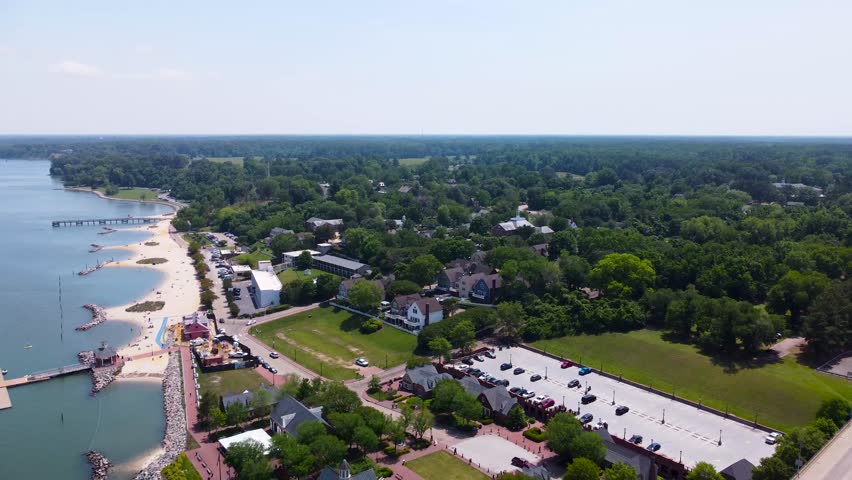 Yorktown, Virginia aerial cinematic video of the waterfront, beaches, marina, and surrounding buildings along the York River.