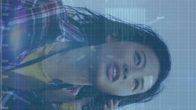 Animation of graphs, binary codes, computer language, asian woman walking and talking on cellphone. Digital composite, multiple exposure, report, business, growth, coding and technology concept. - Powered by Shutterstock - Get 15% off with code: PIKWIZARD15