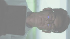 Animation of security padlock icon against asian male engineer using digital tablet at server room. Cyber security and business data storage technology concept - Powered by Shutterstock - Get 15% off with code: PIKWIZARD15