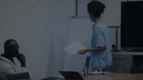 Medical nurse holding reports with DNA helix animation appearing on flipchart while doctor nodding. Healthcare, collaboration, genetics, research, professional, consultation, medical education - Powered by Shutterstock - Get 15% off with code: PIKWIZARD15