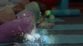 Camera zooming in on prenatal class participant curling dumbbells during fitness session, laughing. Pregnancy, fitness, wellness, exercise, maternity, strength, aerobic - Powered by Shutterstock - Get 15% off with code: PIKWIZARD15