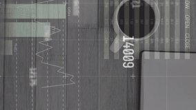 The video shows a business desk with a tablet and coffee. Animation of financial data processing is shown on the tablet. - Powered by Shutterstock - Get 15% off with code: PIKWIZARD15