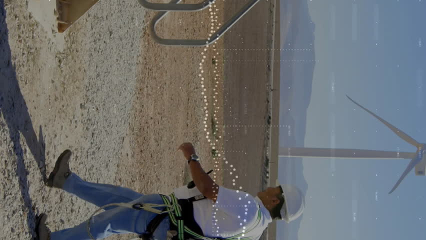 Climbing metal stairs, worker with wind turbine and animation of data visualization. Technology, renewable, energy, engineering, futuristic, analytics - Powered by Shutterstock - Get 15% off with code: PIKWIZARD15