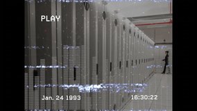 VHS overlay starting on server aisle, technician checking cabinets with glitch and audio bar. Technology, data center, server, cybersecurity, compliance, industrial design, digital infrastructure - Powered by Shutterstock - Get 15% off with code: PIKWIZARD15