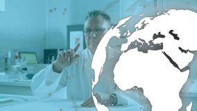 Senior scientist raising finger, interacting with rotating digital globe updating research data. Technology, innovation, data visualization, scientific research, futuristic, digital interface, - Powered by Shutterstock - Get 15% off with code: PIKWIZARD15