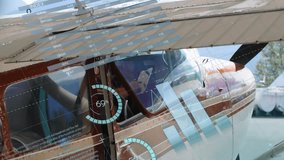 Fading overlay dropping gauge sliding charts across propeller plane pilot moving arms tracking data. Aviation, technology, analytics, cockpit, data visualization, flight operations, transportation - Powered by Shutterstock - Get 15% off with code: PIKWIZARD15