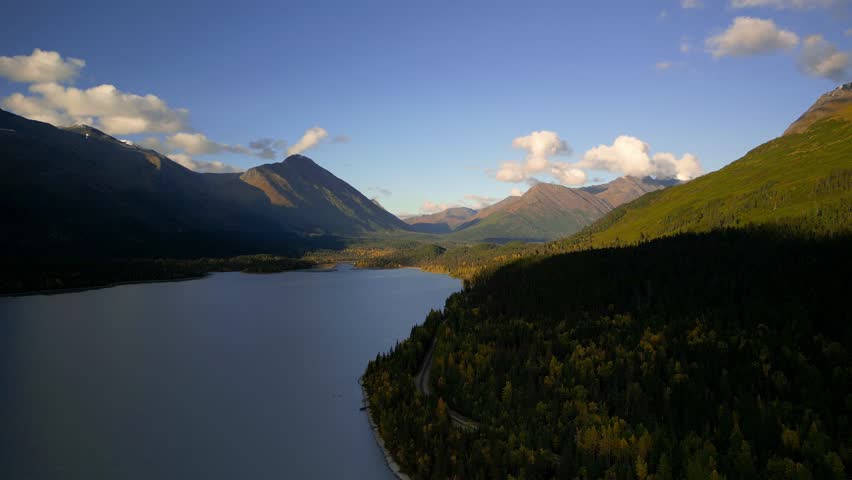Aerial view of Scenic Upper Trail Lake in Alaska countryside during autumn time.