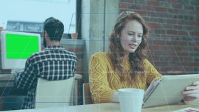 Female colleague swiping tablet screen at desk, updating analytics overlay for business insight. Collaboration, technology, data visualization, office, analytics, teamwork, digital - Powered by Shutterstock - Get 15% off with code: PIKWIZARD15