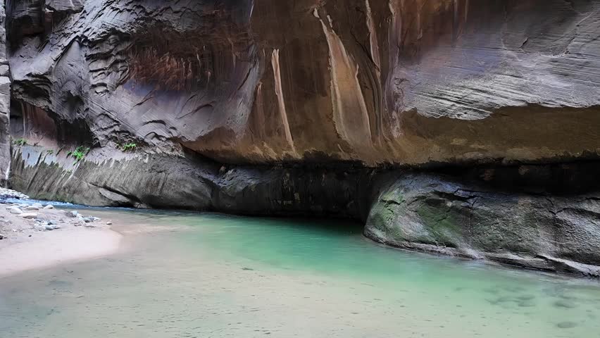 Beautiful serene calm waters and slot canyons in the Narrows hike at zion national park utah in summer