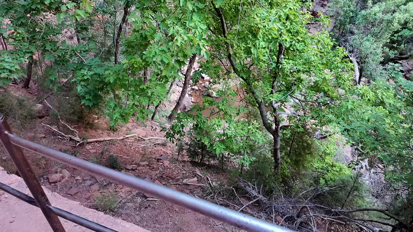 Emerald Pools waterfall hike in zion national park utah on a hot summer day in july