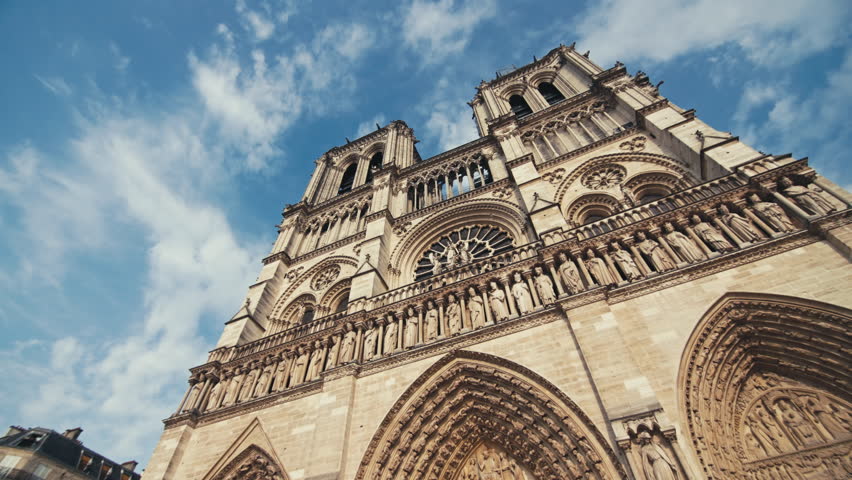 Beautiful view of Notre Dame de Paris cathedral with ancient architecture and historical details in the center of Paris France in the famous European tourist district