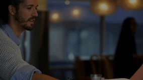 Finance analyst writing on paper showing graph overlay tracking bars, dips, final gain for insight. Financial, analytics, data, business, professional, modern, growth - Powered by Shutterstock - Get 15% off with code: PIKWIZARD15