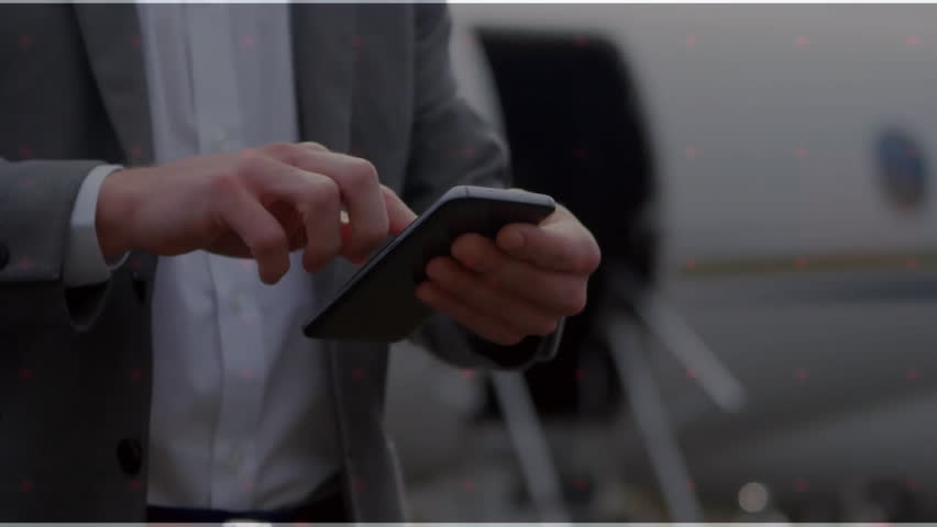 Business traveler tapping smartphone on tarmac, activating scan circle showing past travel timeline. Technology, connectivity, digital, navigation, aviation, professional, modern