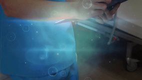 Medical professional tapping tablet and lifting x-ray film in clinic creating overlays for review. Health, diagnostics, technology, healthcare, innovation, patient care, digital - Powered by Shutterstock - Get 15% off with code: PIKWIZARD15