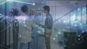 Consultant joining meeting and initiating animated overlay, medical team reviewing patient charts. Medical, collaboration, teamwork, innovation, healthcare, professional, technology - Powered by Shutterstock - Get 15% off with code: PIKWIZARD15