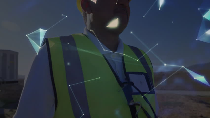 Engineer standing at construction site, nodes drifting overhead visualizing data via rotating globe. Industrial, technology, connectivity, innovation, machinery, infrastructure, futuristic - Powered by Shutterstock - Get 15% off with code: PIKWIZARD15