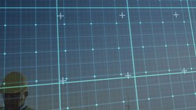 Field engineer tapping and swiping tablet to launch AR diagnostics for wind turbine monitoring. Technology, renewableenergy, industrial, outdoor, inspection, precision, innovation - Powered by Shutterstock - Get 15% off with code: PIKWIZARD15