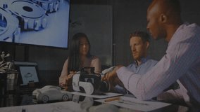 Three colleagues tapping tablet and reviewing data as transparent chart updating for design review. Collaboration, innovation, technology, engineering, data visualization, prototyping, teamwork - Powered by Shutterstock - Get 15% off with code: PIKWIZARD15