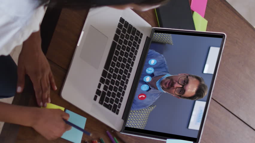 Animation of email icon over caucasian woman on laptop video call. Global social media, business, technology, data processing and digital interface concept digitally generated video. - Powered by Shutterstock - Get 15% off with code: PIKWIZARD15