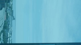 Animation of falling graduating hats over businessmen using smartphone. Global business, finance and economic crisis concept digitally generated video. - Powered by Shutterstock - Get 15% off with code: PIKWIZARD15