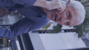 Animation of data processing over caucasian senior man talking on smartphone on the street. Global networking and business technology concept - Powered by Shutterstock - Get 15% off with code: PIKWIZARD15