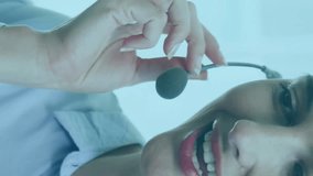 Animation of data processing over happy caucasian businesswoman wearing headset using computer. Business, digital interface, connection, network and communication, digitally generated video. - Powered by Shutterstock - Get 15% off with code: PIKWIZARD15