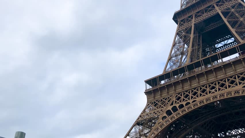 Beautiful close up view of Eiffel Tower against sky in Paris, France.