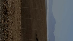 Animation of financial data and graph over landscape with wind turbines. Ecology, green energy, eco power, finance and economy concept digitally generated video. - Powered by Shutterstock - Get 15% off with code: PIKWIZARD15