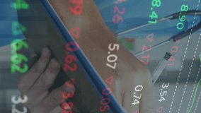 Animation of financial data processing over caucasian male doctor with stethoscope. Global medicine, business, finances, computing and data processing concept digitally generated video. - Powered by Shutterstock - Get 15% off with code: PIKWIZARD15