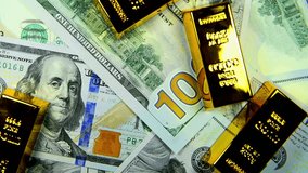 Paper us 100 dollar bill with gold bars, concept of investment and saving, wealth - Powered by Shutterstock - Get 15% off with code: PIKWIZARD15