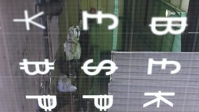 Animation of interface with multiple currency symbols against industrial scrap metal in warehouse. Waste management and recycling concept - Powered by Shutterstock - Get 15% off with code: PIKWIZARD15