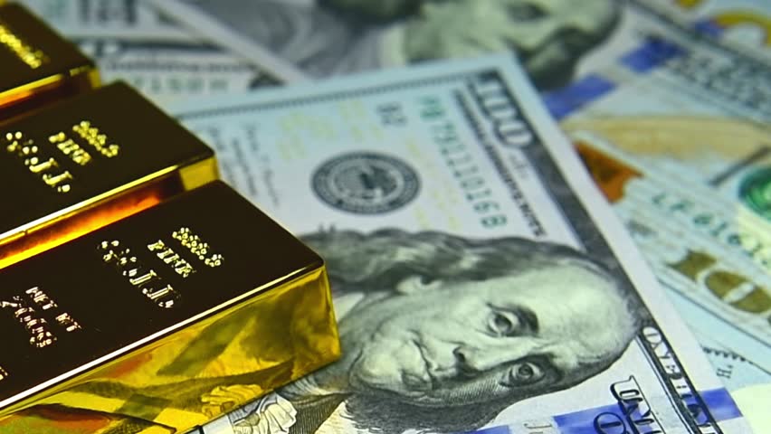 Paper us 100 dollar bill with gold bars, concept of investment and saving, wealth