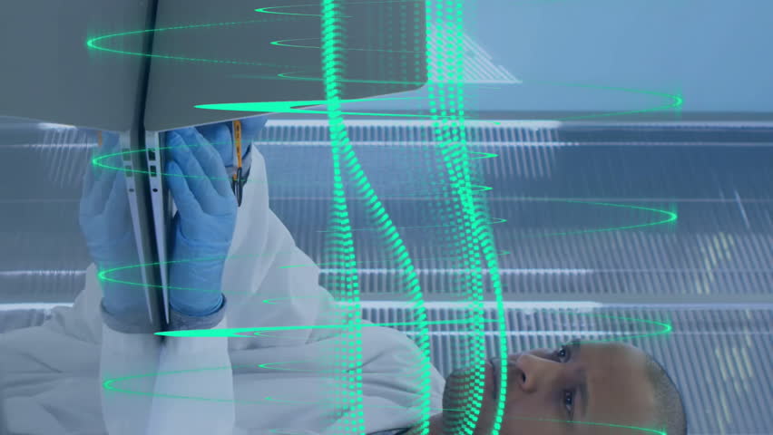 Animation of scientific data processing over male scientist in laboratory. Global science, connections, computing and data processing concept digitally generated video. - Powered by Shutterstock - Get 15% off with code: PIKWIZARD15