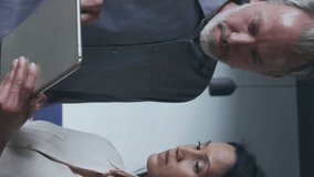 Animation of financial data processing over diverse business people in office. Global finance, business, connections, computing and data processing concept digitally generated video. - Powered by Shutterstock - Get 15% off with code: PIKWIZARD15