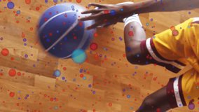 Dribbling basketball on court, DNA strand animation over wooden floor. sports, genetics, science, health, athlete, game - Powered by Shutterstock - Get 15% off with code: PIKWIZARD15