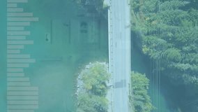 Aerial view of road over water with data processing animation overlay. Technology, digital, connectivity, infrastructure, transportation, network - Powered by Shutterstock - Get 15% off with code: PIKWIZARD15