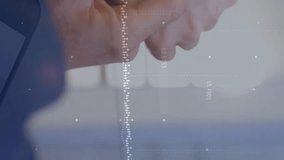 Animation of financial data processing over caucasian man using smartwatch. Global finance, business, connections, computing and data processing concept digitally generated video. - Powered by Shutterstock - Get 15% off with code: PIKWIZARD15