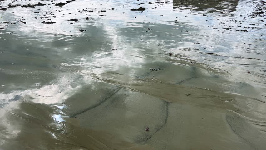 Sandy beach on the English Channel at low tide in Saint-Malo. Grande Plage du Sillon. Saint-Malo, Ille-et-Vilaine, Brittany, France.