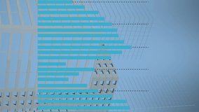 Animation of graphs over office buildings. Global business, finance, economy and technology concept digitally generated video, - Powered by Shutterstock - Get 15% off with code: PIKWIZARD15
