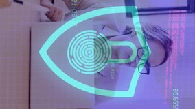 Animation of digital shield with padlock over happy caucasian female and male coworkers. Business, data processing, security, connections and technology concept digitally generated video. - Powered by Shutterstock - Get 15% off with code: PIKWIZARD15