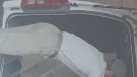 Statistical data processing against caucasian delivery man stacking boxes in his delivery van. logistics and transportation business concept - Powered by Shutterstock - Get 15% off with code: PIKWIZARD15