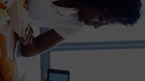 Animation of trading boards, graphs over diverse female explaining reports to coworkers on tablet. Digital composite, multiple exposure, report, business, stock market, teamwork, technology concept. - Powered by Shutterstock - Get 15% off with code: PIKWIZARD15