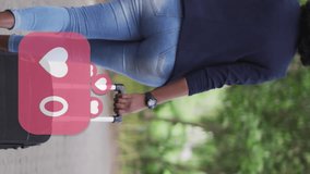 Animation of social media heart icons over african american woman riding bicycle in park. global communication technology and social network concept digitally generated video. - Powered by Shutterstock - Get 15% off with code: PIKWIZARD15