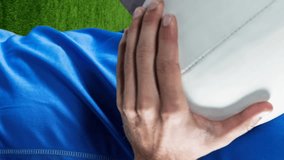 Golden confetti falling over caucasian male rugby player holding a rugby ball against sports stadium. sports and competition concept - Powered by Shutterstock - Get 15% off with code: PIKWIZARD15