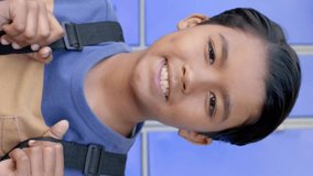 Smiling student with backpack, back-to-school bargains animation over blue lockers. Education, discount, supplies, academic, children - Powered by Shutterstock - Get 15% off with code: PIKWIZARD15