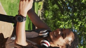 Animation of light bulb icons over african american woman using smartphone. Global social media, networks, digital interface and data processing concept digitally generated video. - Powered by Shutterstock - Get 15% off with code: PIKWIZARD15